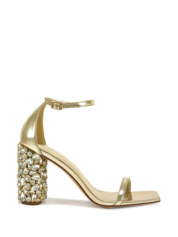 metallic gold open toe heeled sandals with a crystal embellished block heel and an adjustable ankle strap closure