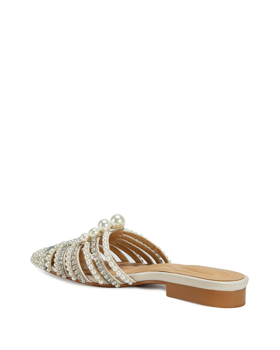 back view of sparkly pointed toe slip on flat sandals with a caged upper lined with faux pearl and rhinestone embellishments