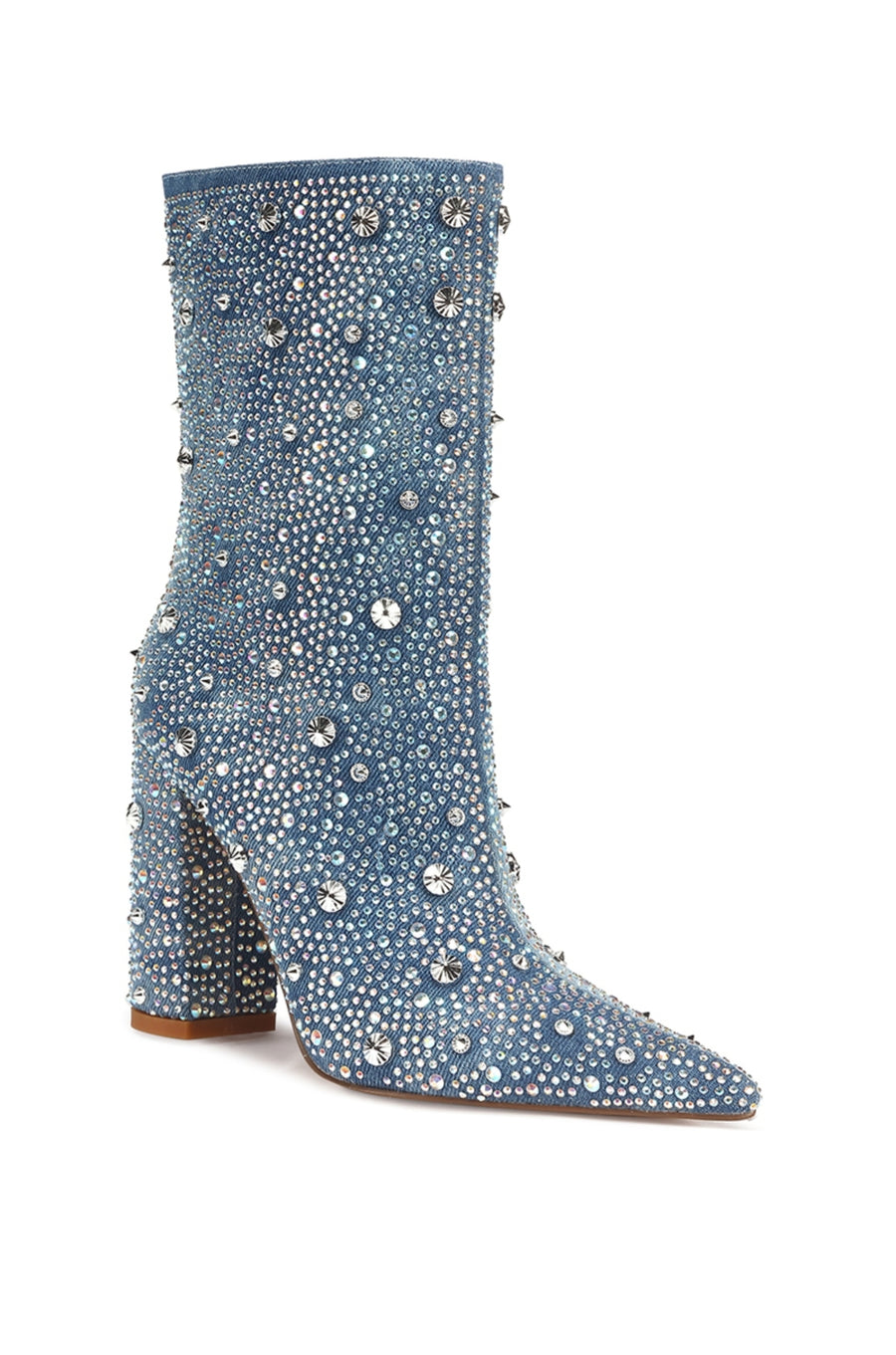 angled view of denim ankle bootie with a pointed toe, block heel, and rhinestone embellishments