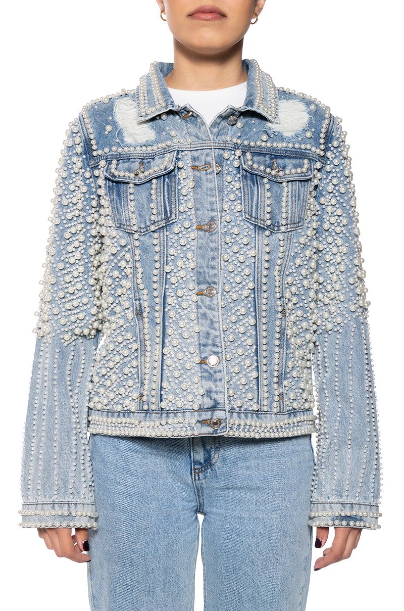 denim statement jacket with distressing below the collar and pearl embellished accents all over the jacket