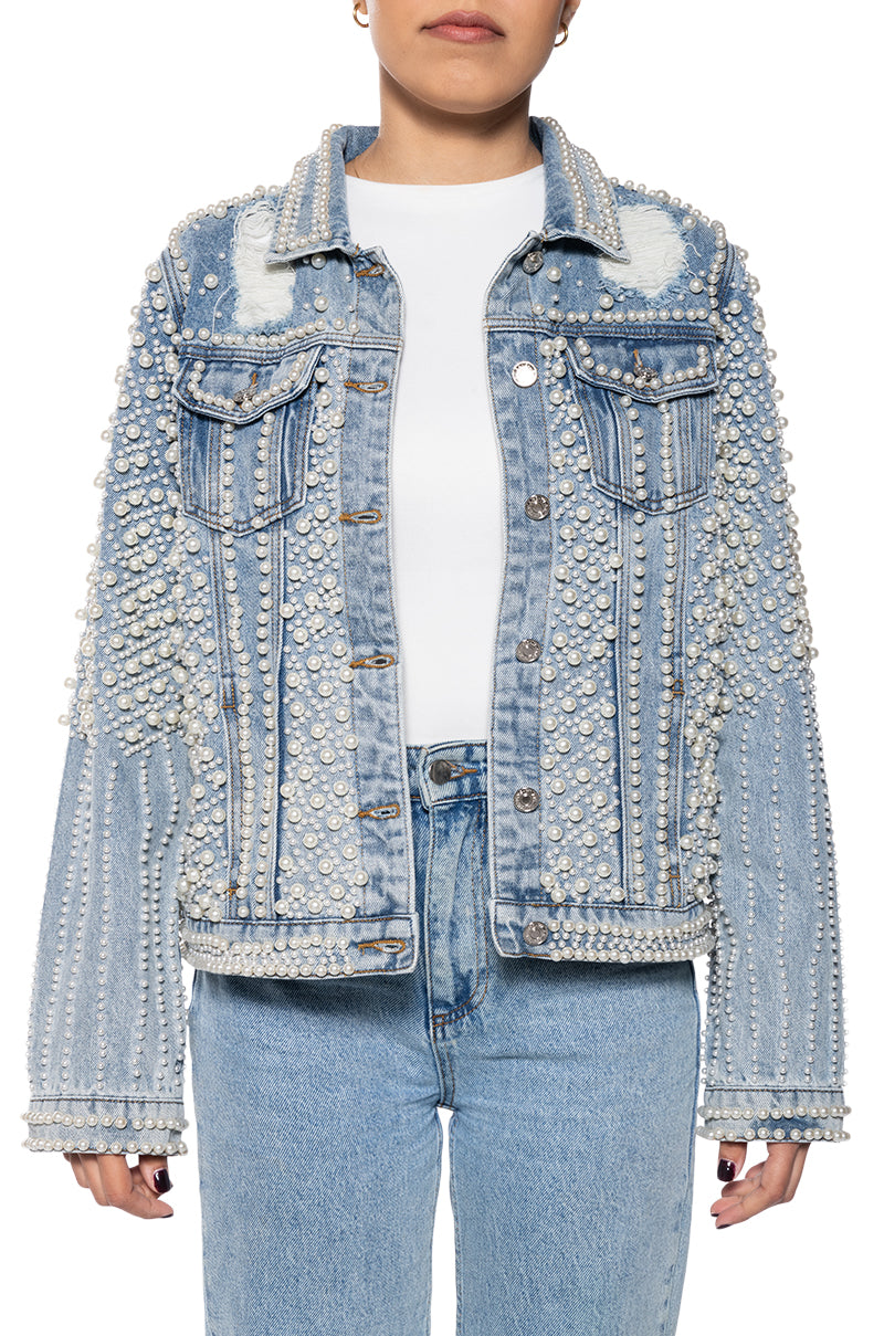 denim statement jacket with distressing below the collar and pearl embellished accents all over the jacket