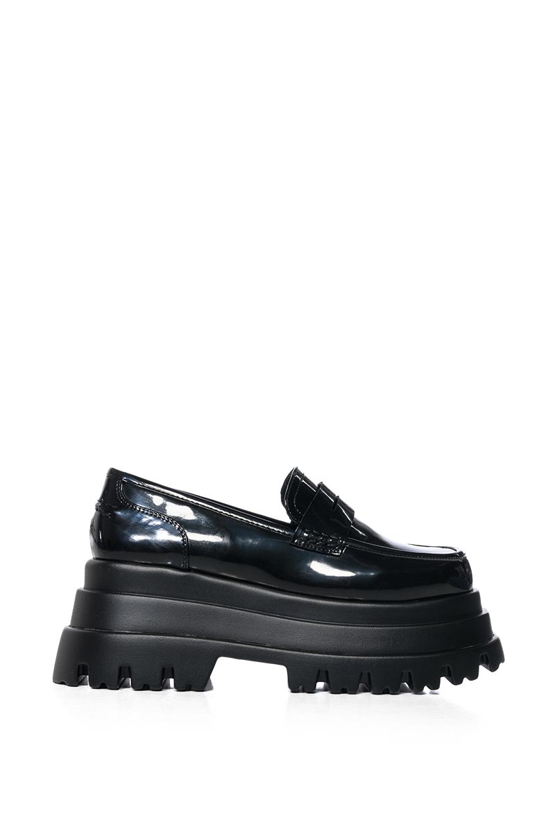 ultra platform faux patent leather statement loafers with a chunky platform sole