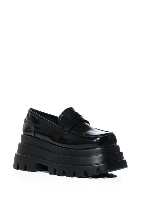 angled view of ultra platform faux patent leather statement loafers with a chunky platform sole