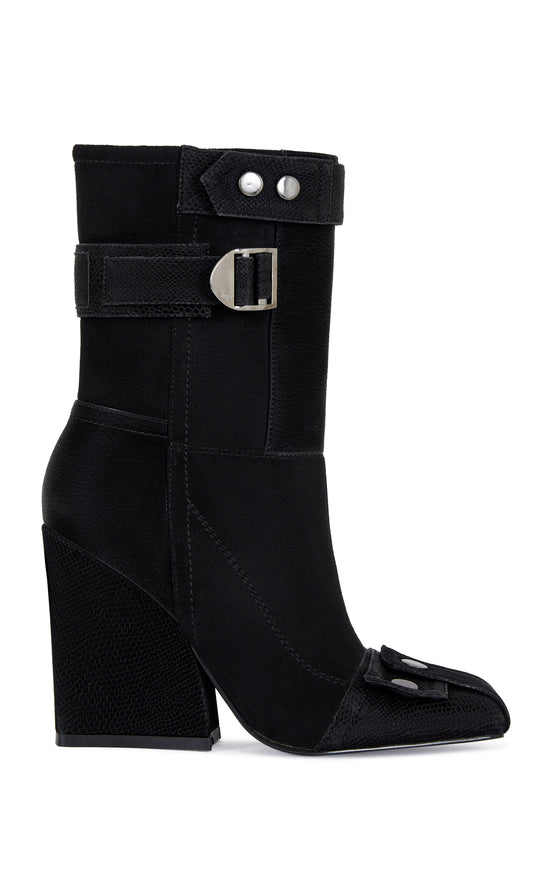 black faux suede statement bootie with a square toe, block heel, and silver studded accents 