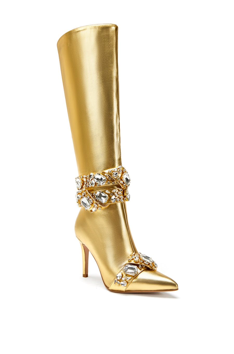 angled view of shiny metallic gold faux leather mid calf length boots with crystal rhinestone band accent on the ankle and on the front