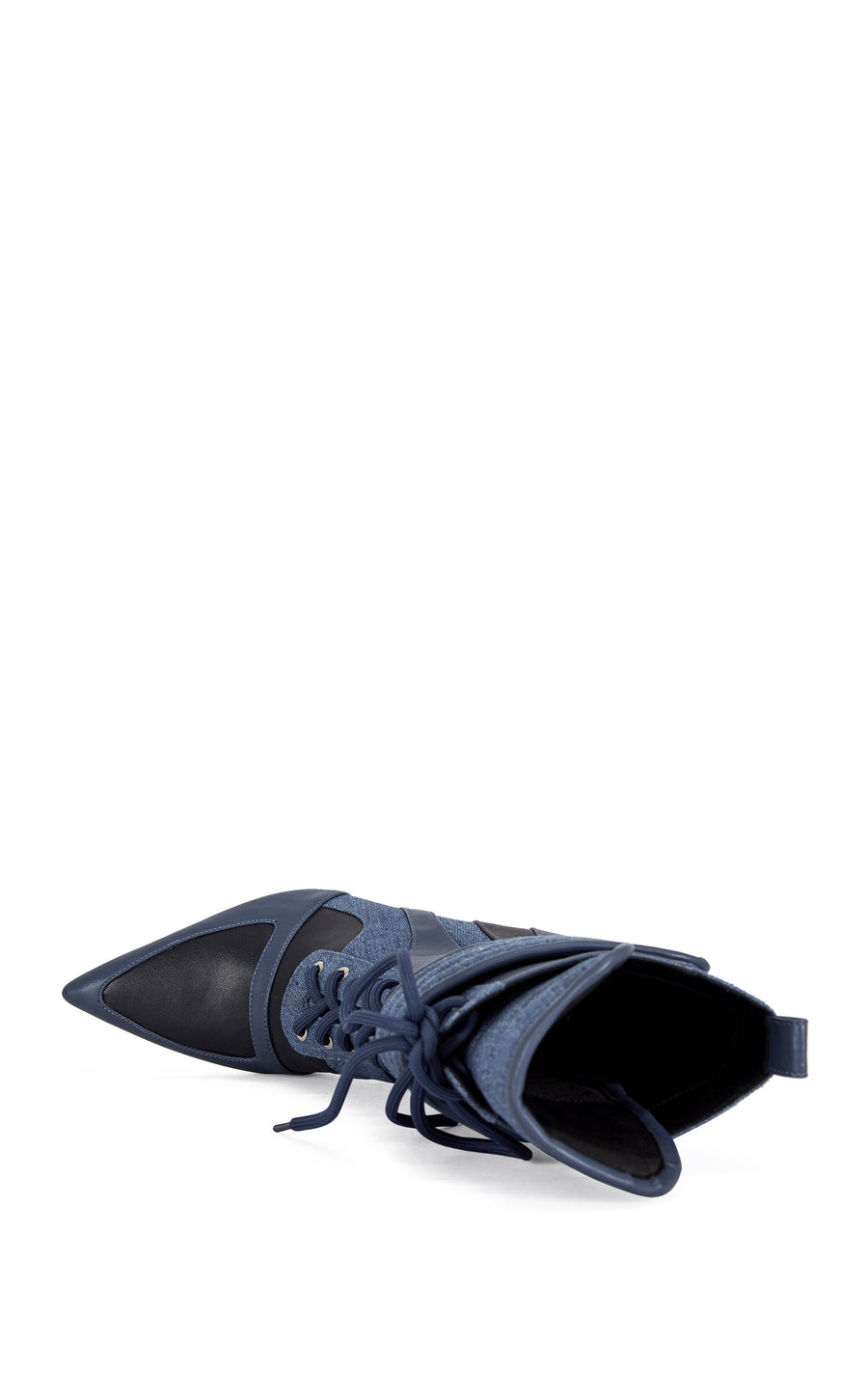 dark wash denim and navy blue faux leather heeled boots with a mid calf length, lace up accent, and velcro belted accent with an inner zip up closure