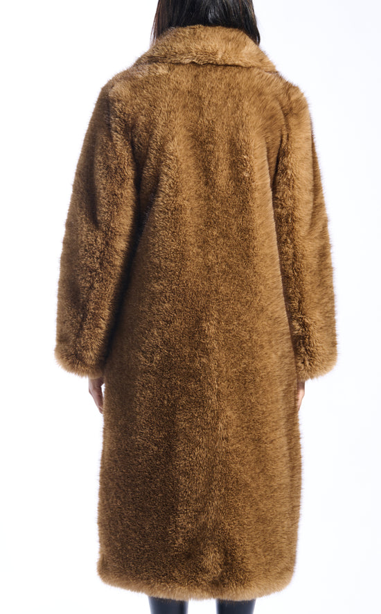 light brown faux fur statement trench coat with an oversized collar and pockets on the front sides