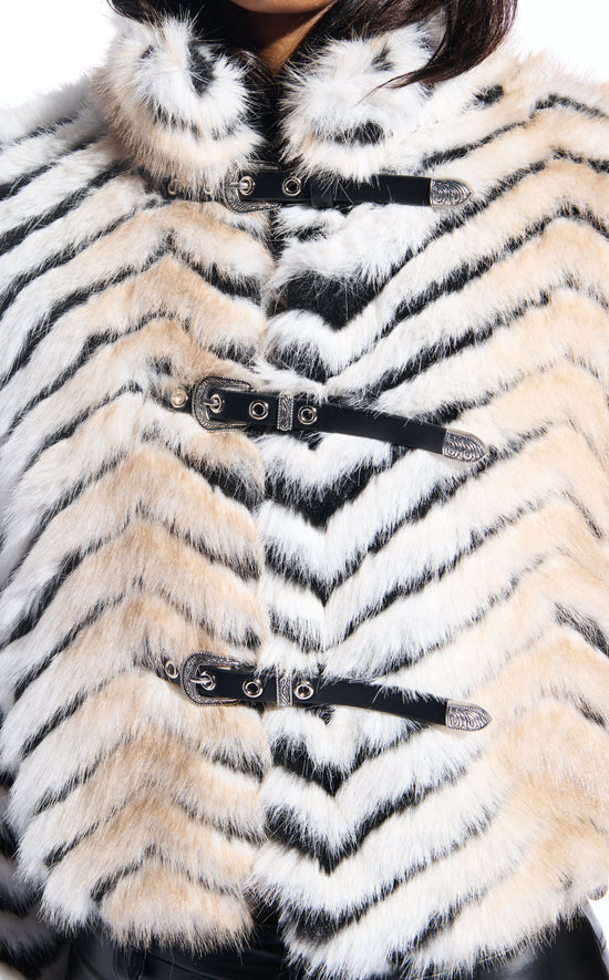 black and beige stripe print faux fur statement coat with a cropped silhouette and adjustable western inspired belt closure accents