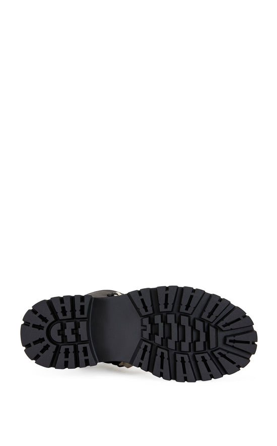 black faux leather chunky statement combat boots with a white shoelace accent scattered over the front boot shaft