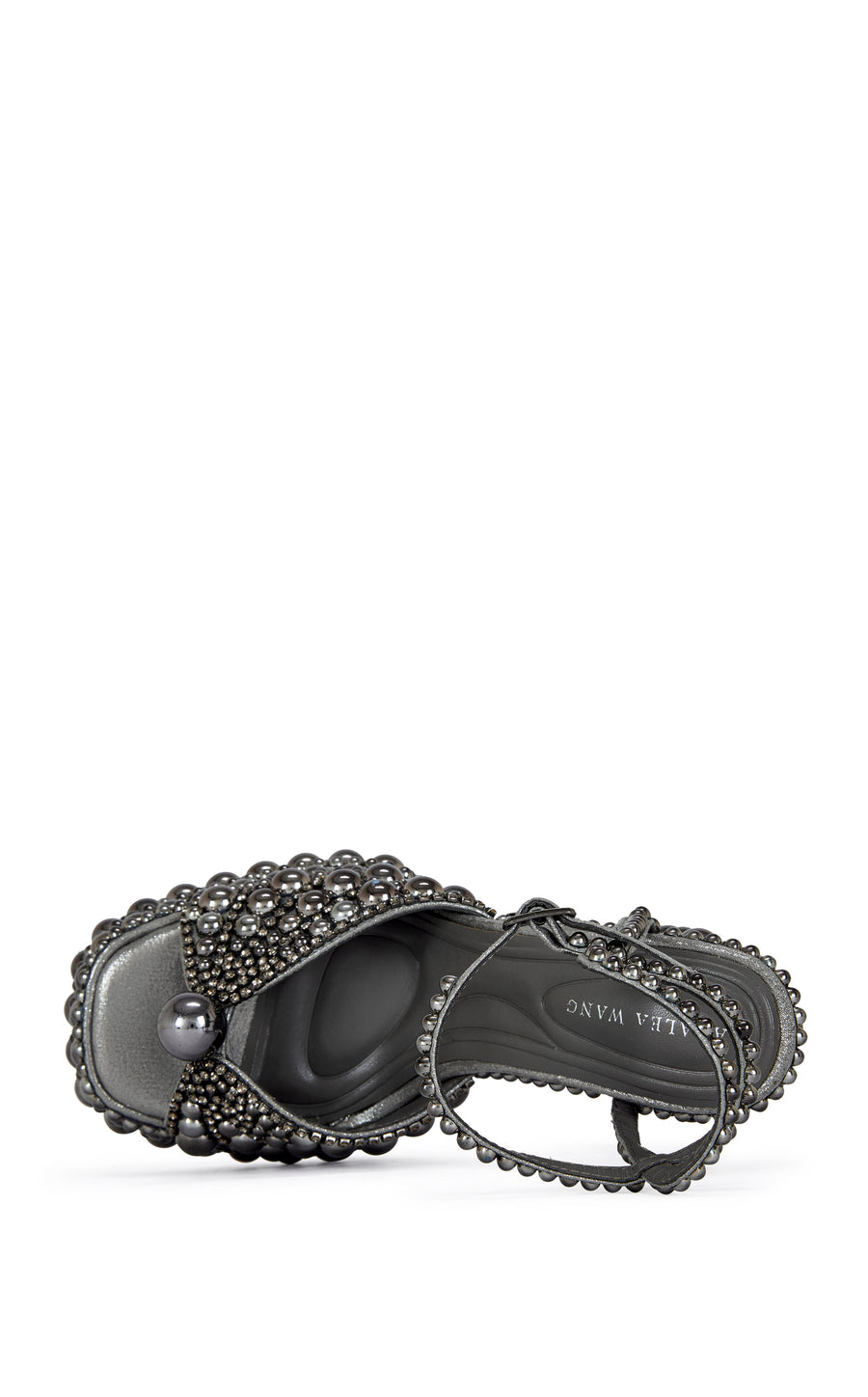 platform heeled peep toe statement heels with hematite pearl embellishments all over the heel, finished with an adjustable ankle strap
