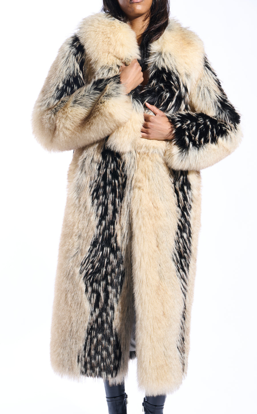 beige and black patterned faux fur statement trench coat wit an oversized collar and pockets