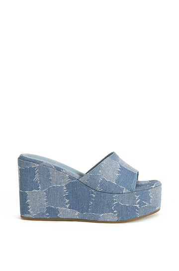 platform statement sandals with a patchwork denim design on the sole and foot strap