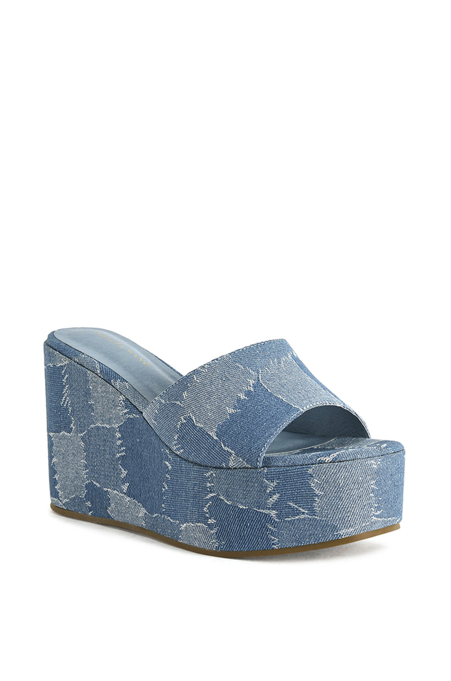 platform statement sandals with a patchwork denim design on the sole and foot strap