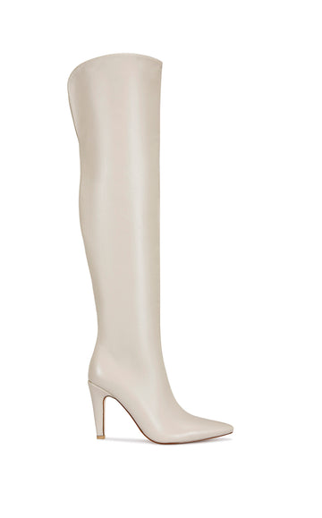 bone faux leather thigh high boots with a stiletto heel and pointed toe silhouette