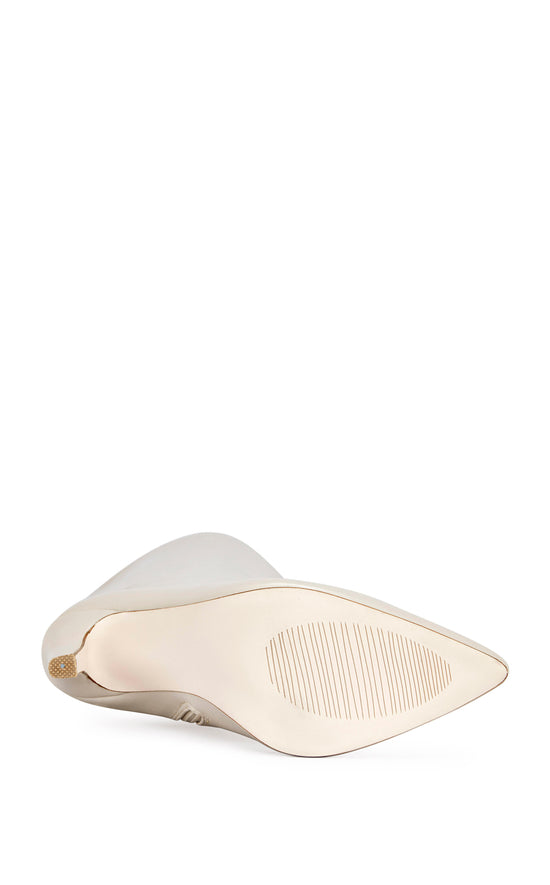 bone faux leather thigh high boots with a stiletto heel and pointed toe silhouette