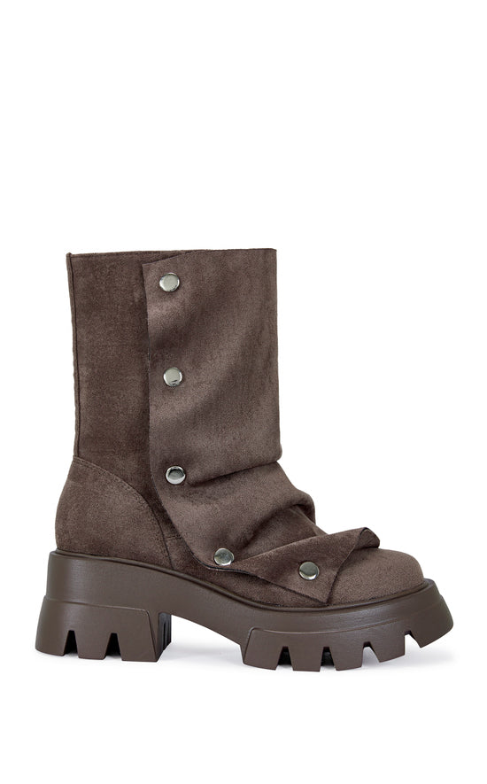 fashion forward brown faux suede ankle length combat booties with an adjustable snap overlay