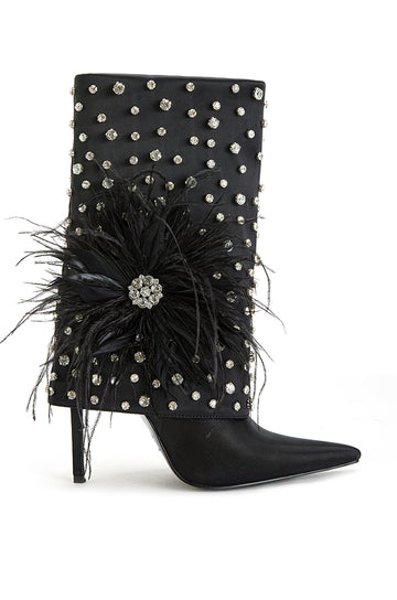 black pointed toe heel boots with fold over silhouette and rhinestone flower detail