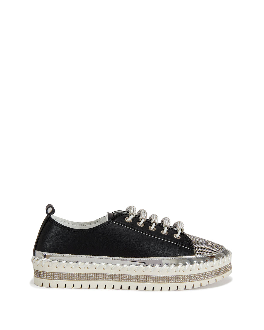 black faux leather statement sneakers with a white platform sole and a crystal embellished toe and side of the sole