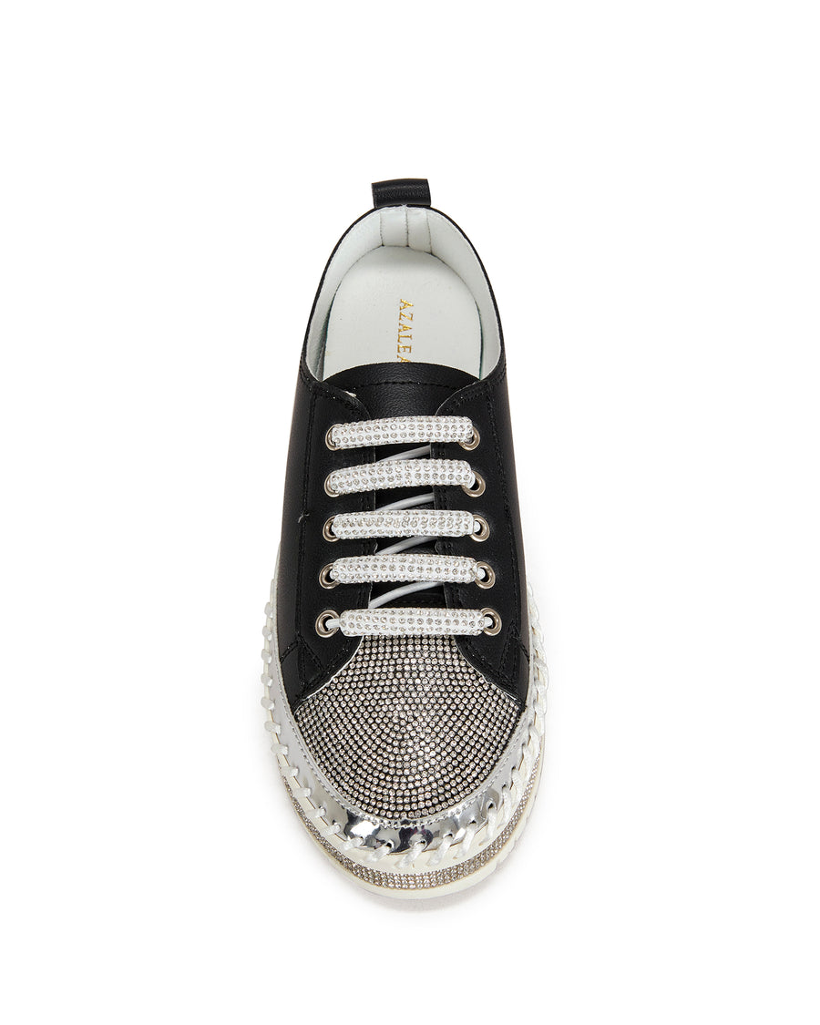 top view of black faux leather statement sneakers with a white platform sole and a crystal embellished toe and side of the sole