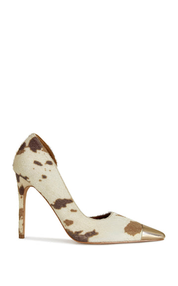 chic faux calf hair stiletto pumps with a cow print design and a gold toe cap