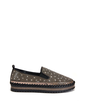 black slip on espadrille sneakers with a gold rhinestone embellished upper and a chunky black platform sole