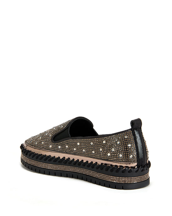 black slip on espadrille sneakers with a gold rhinestone embellished upper and a chunky black platform sole