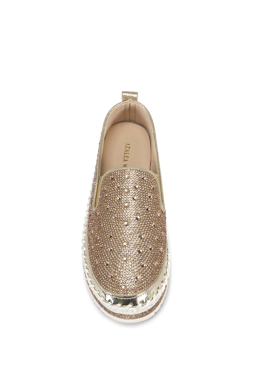 top view of slip on metallic rose gold flat sneakers with crystal rhinestone embellishments and a white braided platform sole
