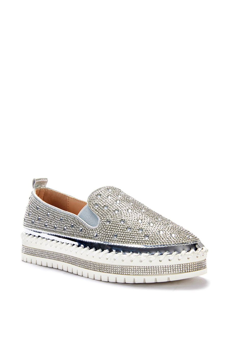 angled view of slip on metallic silver flat sneakers with crystal rhinestone embellishments and a white braided platform sole