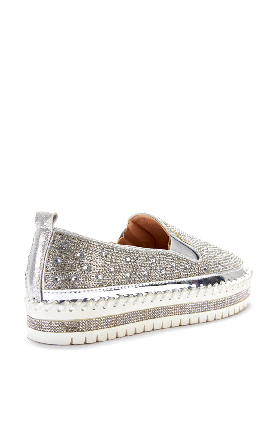 back view of slip on metallic silver flat sneakers with crystal rhinestone embellishments and a white braided platform sole