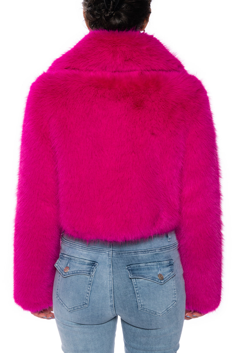 back view of luxurious pink faux fur cropped jacket