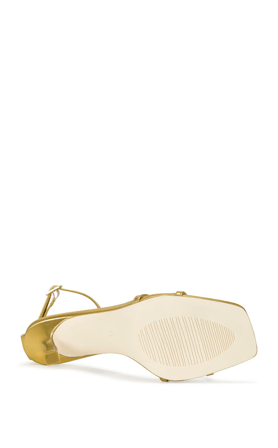 gold faux leather open toe strappy sandals with a stiletto heel and adjustable ankle strap
