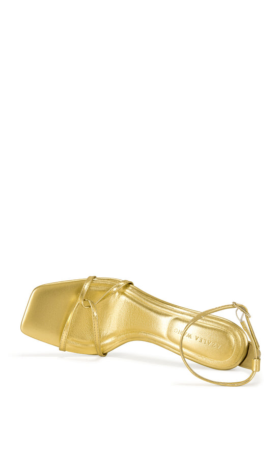 gold faux leather open toe strappy sandals with a stiletto heel and adjustable ankle strap