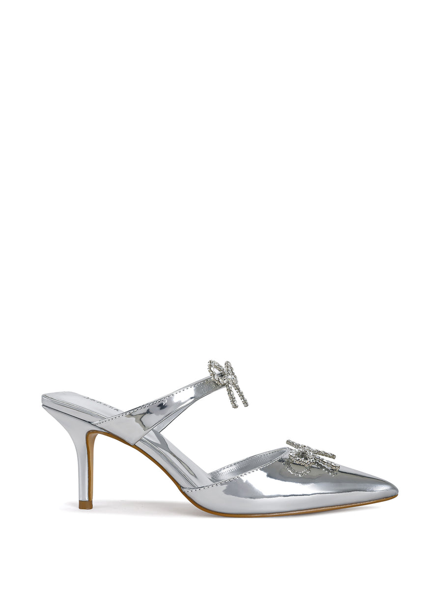 silver slip on kitten heels with crystal embellished bow accents on the upper