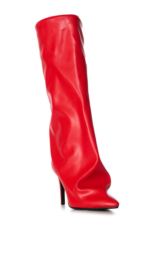 red faux leather statement stiletto boot with a slouched shaft and a pointed toe silhouette 