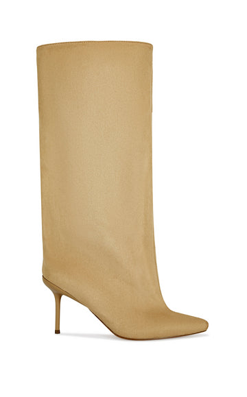 beige faux suede knee high boot with a pointed toe, stiletto heel, and a slouched shaft