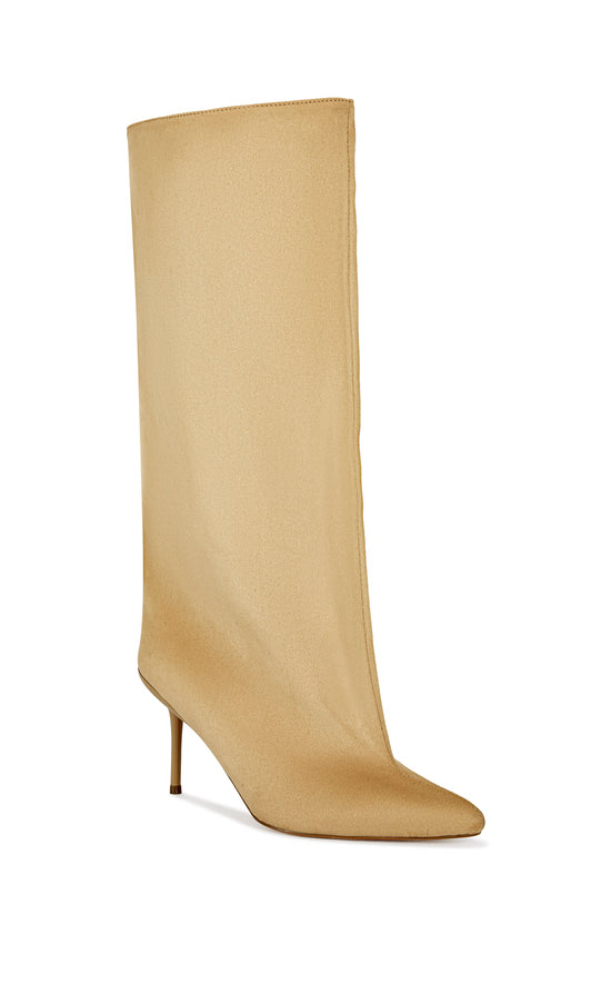beige faux suede knee high boot with a pointed toe, stiletto heel, and a slouched shaft