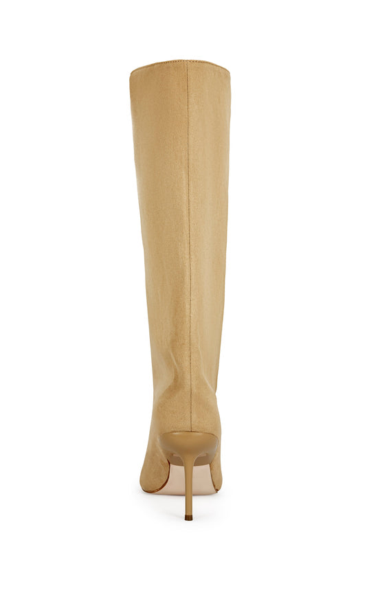 beige faux suede knee high boot with a pointed toe, stiletto heel, and a slouched shaft