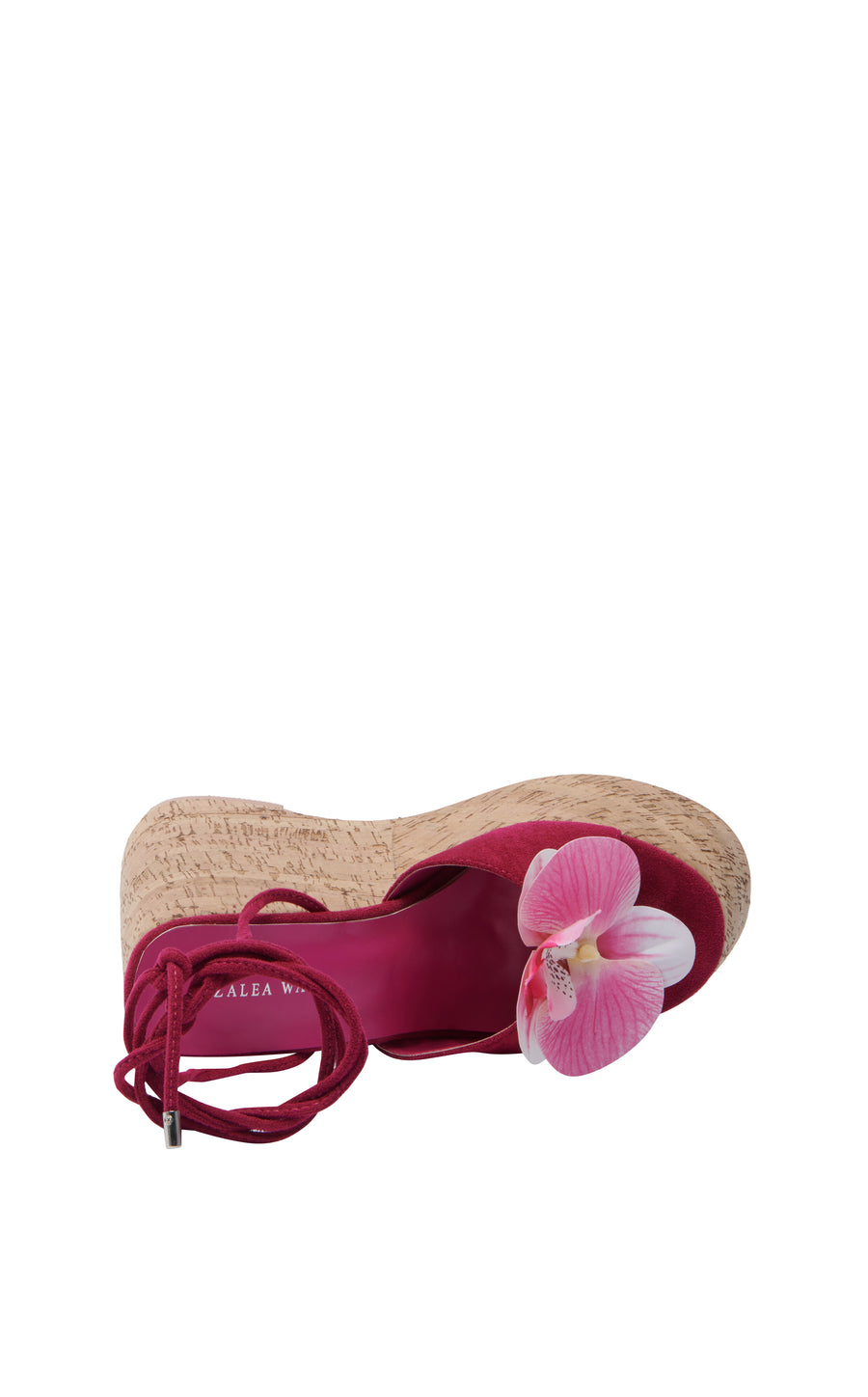 ultra platform heeled wedge sandals with an open toe and fuchsia faux suede upper with an orchid flower accent on the foot strap and two faux suede wrap cords