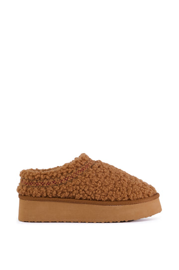 platform chestnut brown fuzzy slippers with a stitching design around the slipper opening