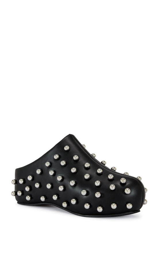 black faux leather statement mule with a sip on fit and circular stud embellishments on the upper