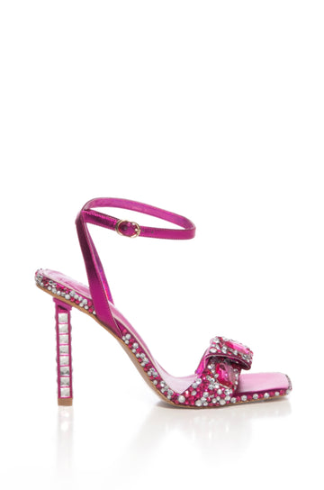 pink strappy heels with an ankle strap and rhinestone detail on the front strap, sides, and heel