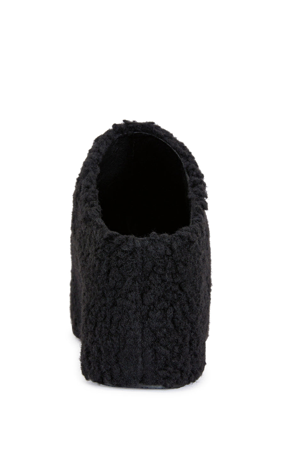 black faux sherpa slip on mule with a  curved platform sole