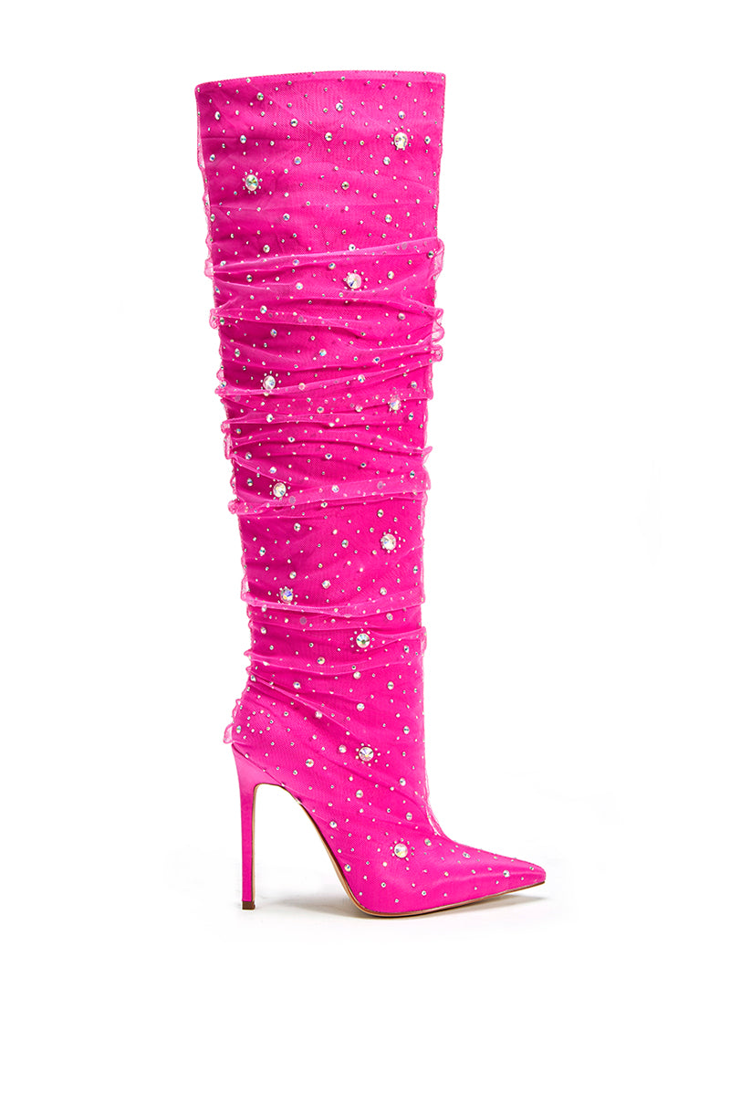 side view of knee high hot pink stiletto boots with a pointed toe and rhinestone embellished mesh overlay