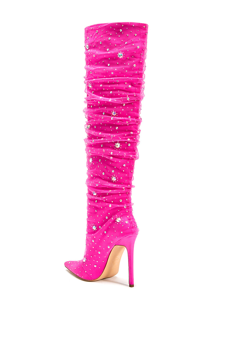 back view of knee high hot pink stiletto boots with a pointed toe and rhinestone embellished mesh overlay