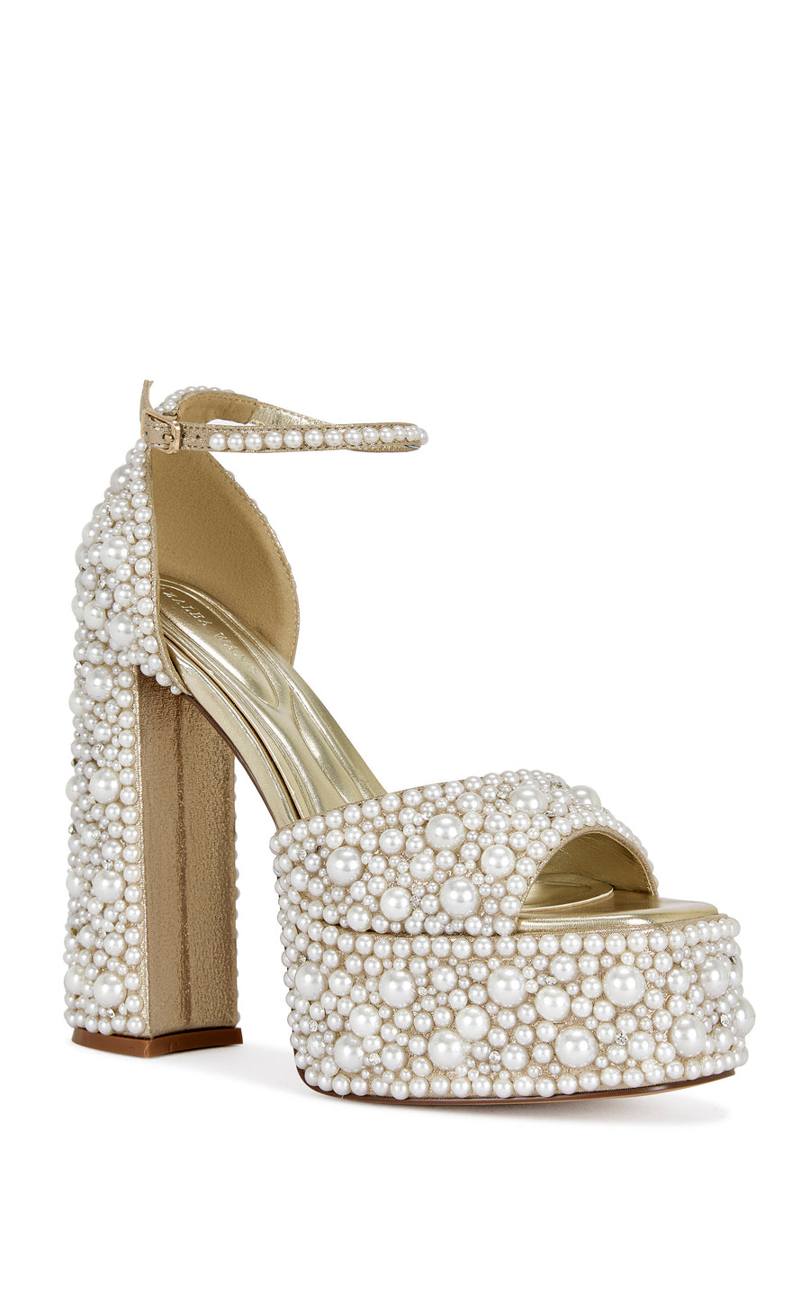 gold faux leather statement platform heels with an open toe, block heel, adjustable ankle straps adorned with faux pearl embellishments all over the heel