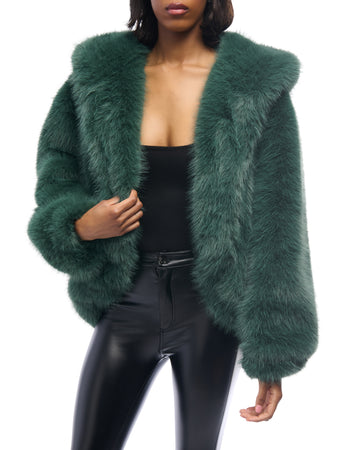 emerald green faux fur statement coat with a high low silhouette and an oversized collar