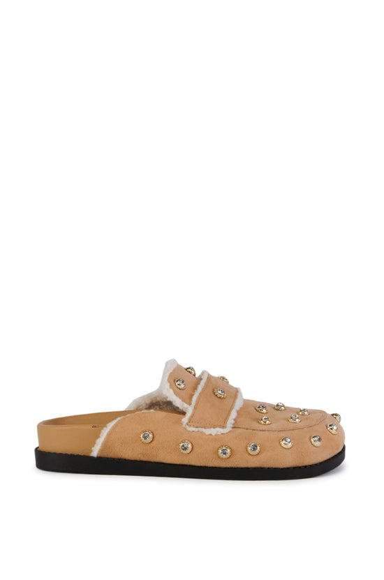 beige slip on flat mule with a faux sherpa lining and and silver studded embellishments