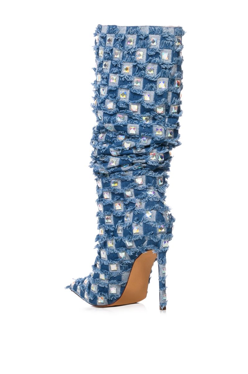 back view of pointed toe stiletto boots with mid calf length and denim fabrication with checker print fringe and rhinestone studded accents