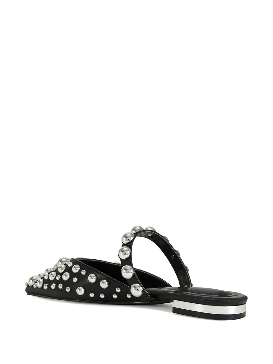 black faux leather pointed toe slip on flat sandals with large silver circular stud embellishments