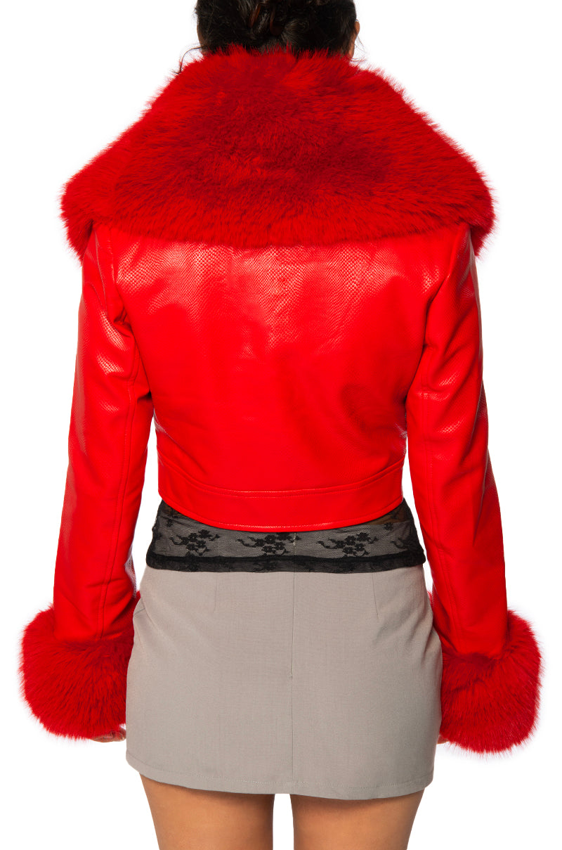 back view of Cherry red faux leather jacket with red faux fur collar and cuffs